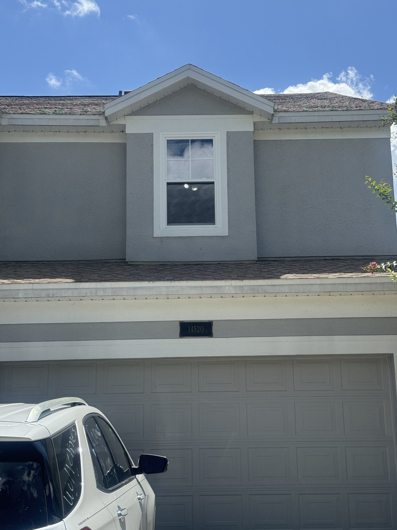 New impact window in garage — bright natural light