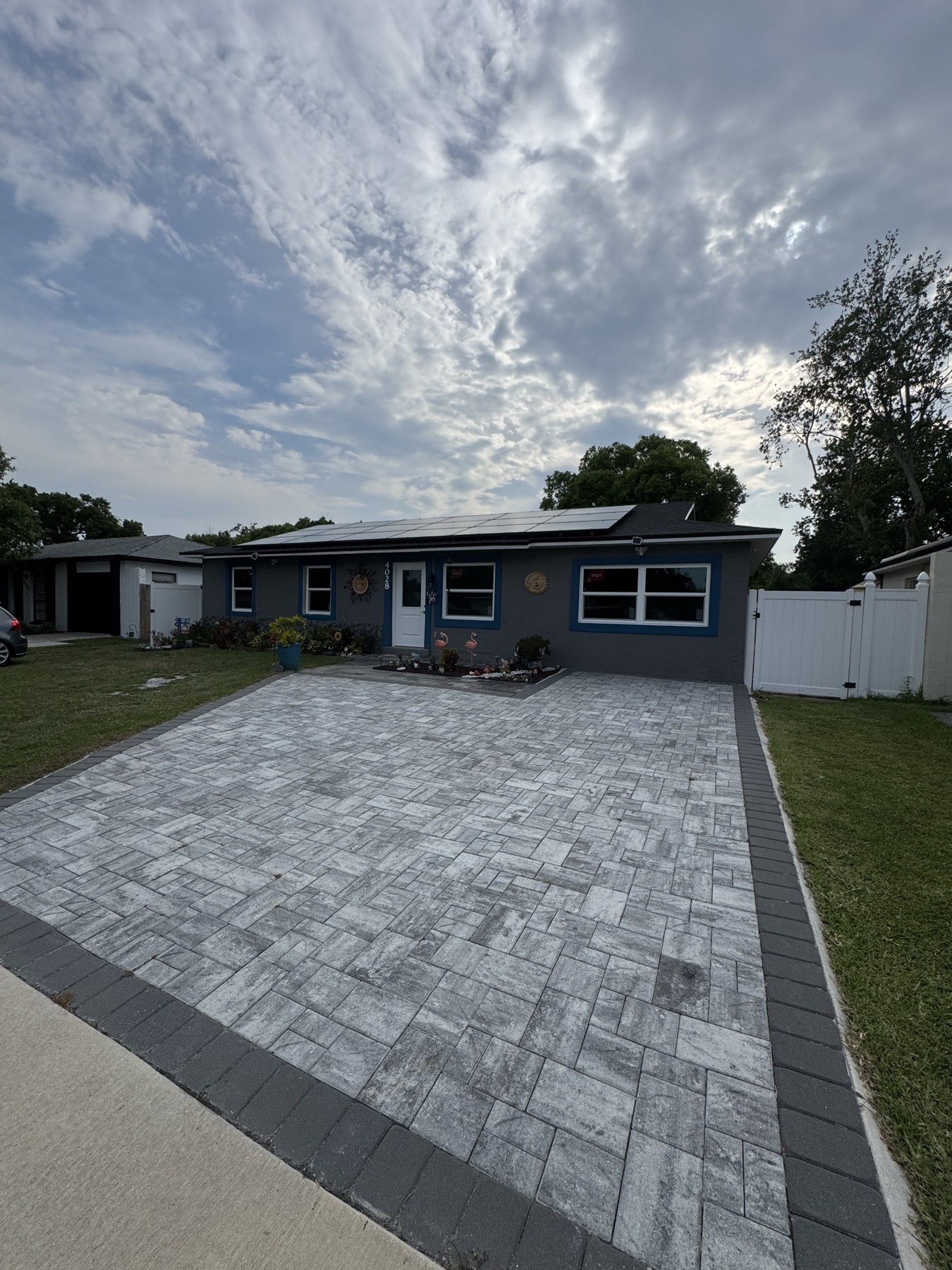 Finished home — new windows and stamped concrete driveway